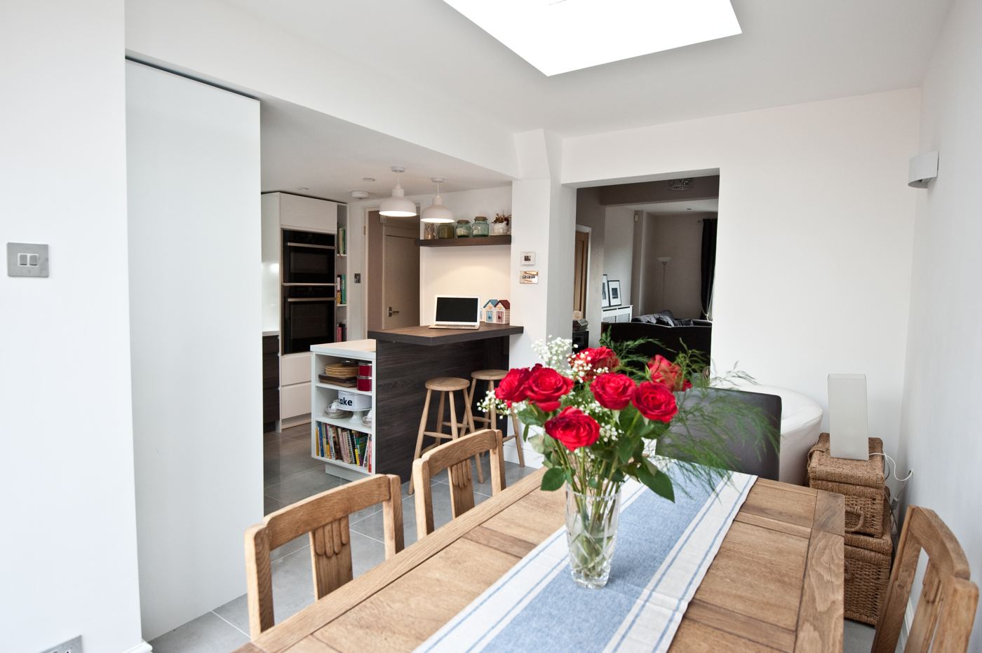 Dining table in an open-plan kitchen extension