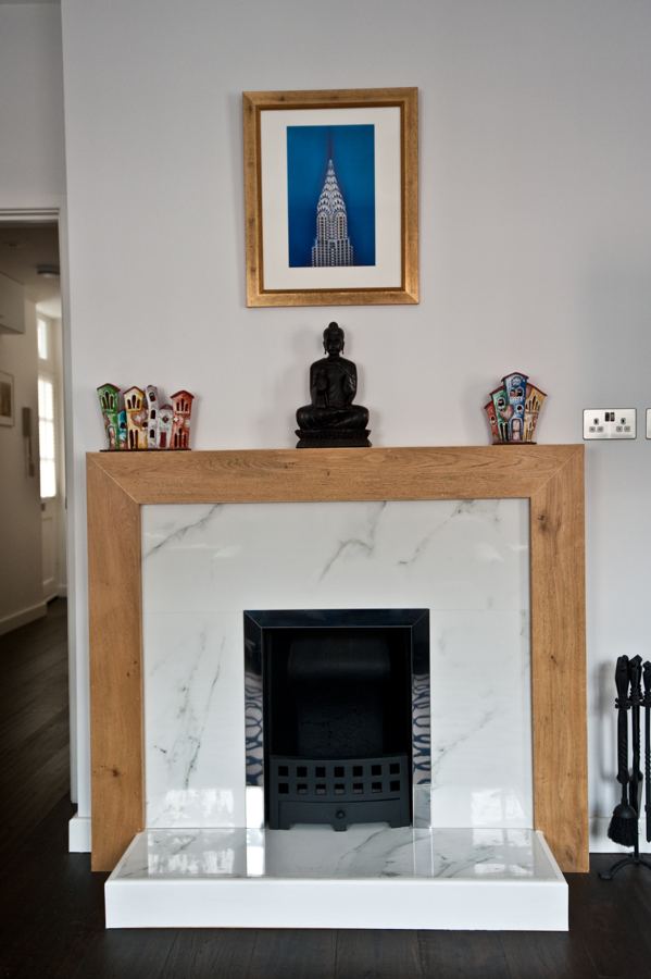 Marble fireplace with timber surround