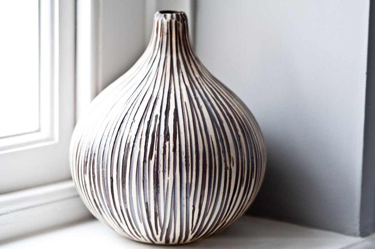 Ceramic vase on a window sill